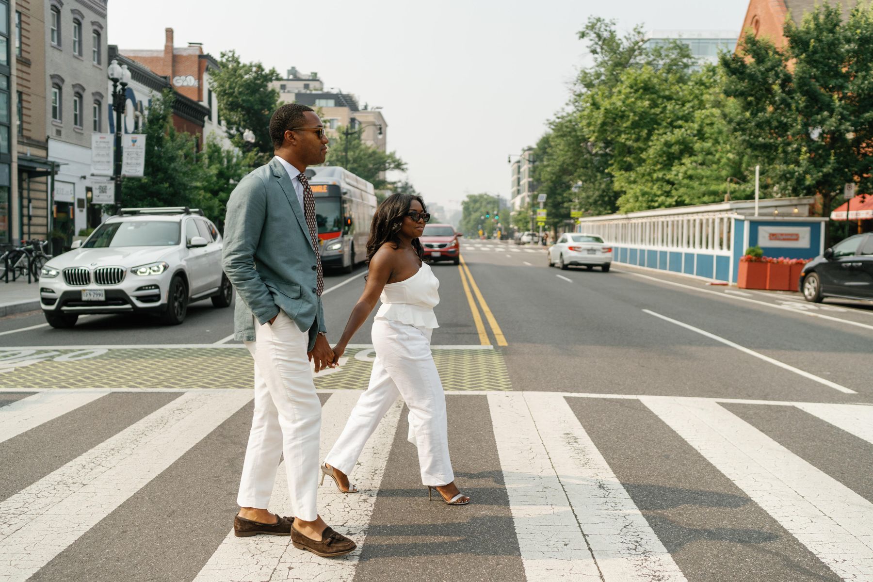Mr. and Mrs. Roberts crossing a street in Washington, DC